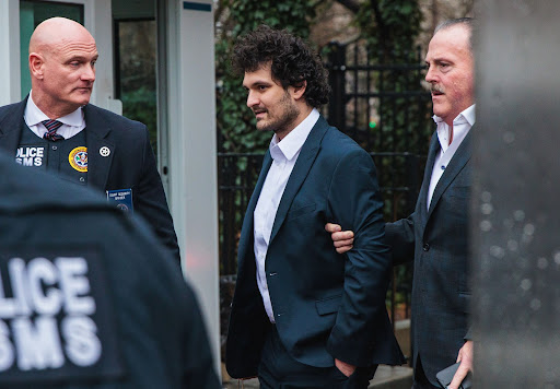 Sam Bankman-Fried departs from court in New York, on Dec. 22, 2022. Photographer: Stephen Yang/Bloomberg